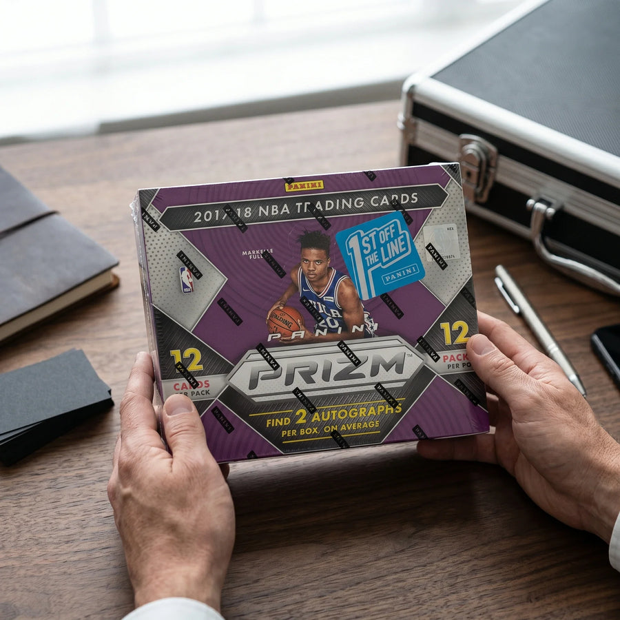 Collector hands displaying 2017-18 Panini Prizm Basketball FOTL Trading Cards on a premium card-shop desk.