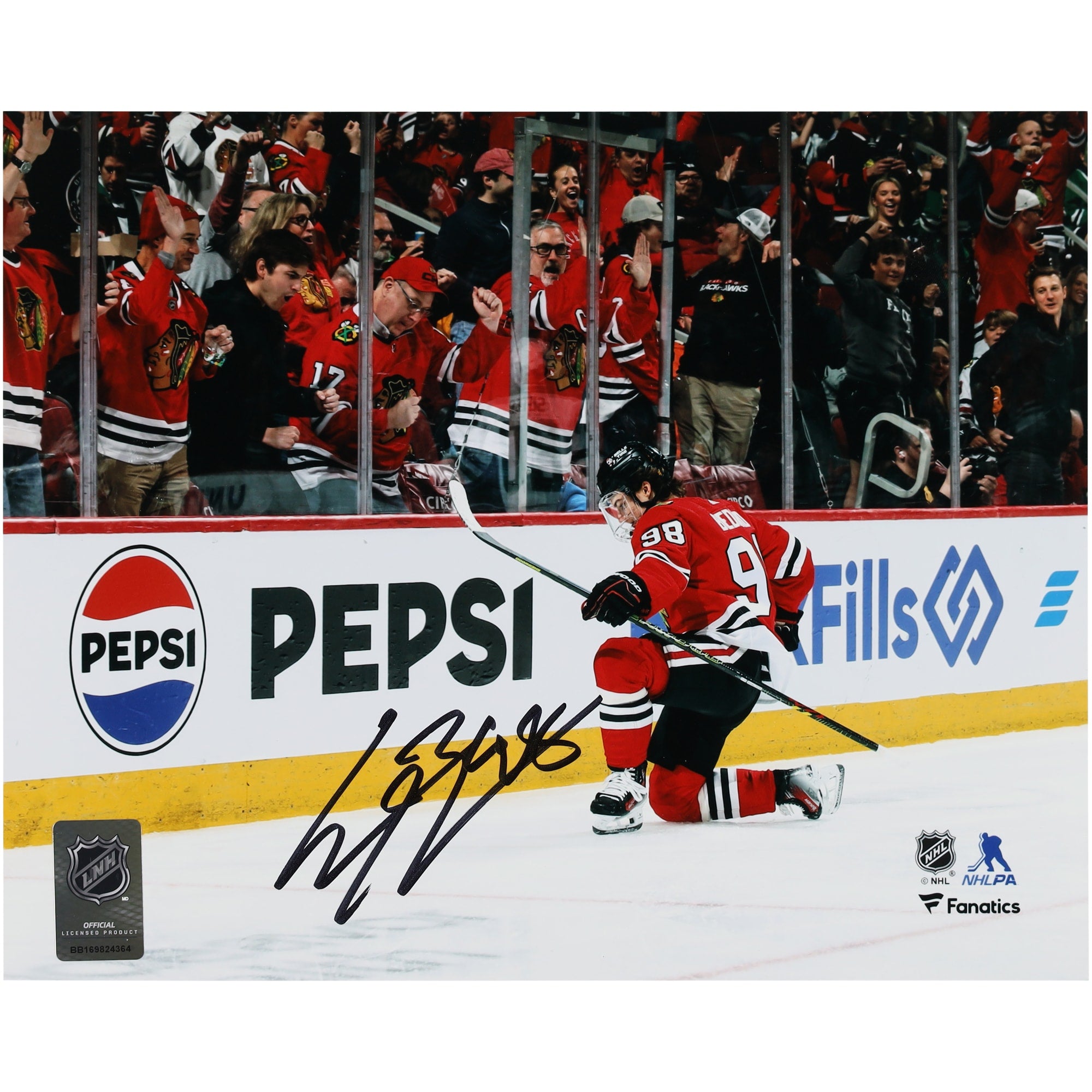 Connor Bedard Chicago Blackhawks Autographed Fanatics Authentic 8" x 10" Red Jersey Celebration Photograph
