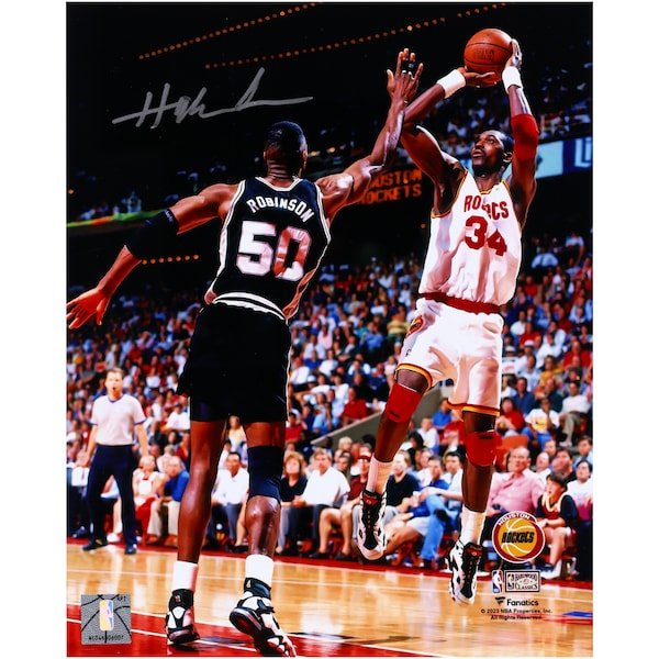 Hakeem Olajuwon Houston Rockets Autographed Fanatics Authentic 8" x 10" Jump Shot Over David Robinson Photograph - The Ballers Bank