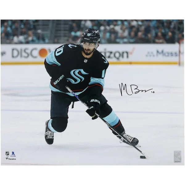Matty Beniers Signed Seattle Kraken 16 x 20 Navy Jersey with Puck Photograph