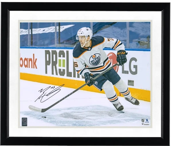 Evan Bouchard Signed Edmonton Oilers 16 x 20 Photograph | Jersey with Puck
