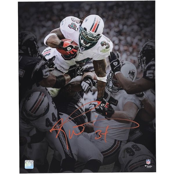 Ricky Williams Miami Dolphins Autographed Fanatics Authentic 16" x 20" Touchdown Leap Spotlight Photograph - The Ballers Bank