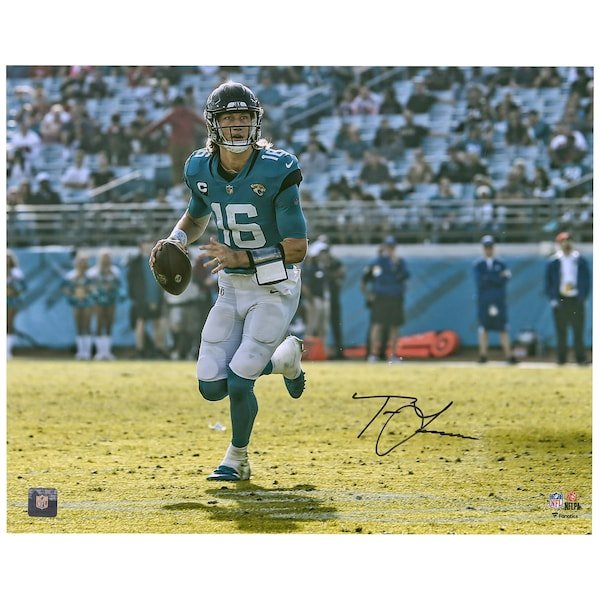 Trevor Lawrence Jacksonville Jaguars Fanatics Authentic Autographed 16'' x 20'' Horizontal Teal Jersey Rollout Photograph - The Ballers Bank